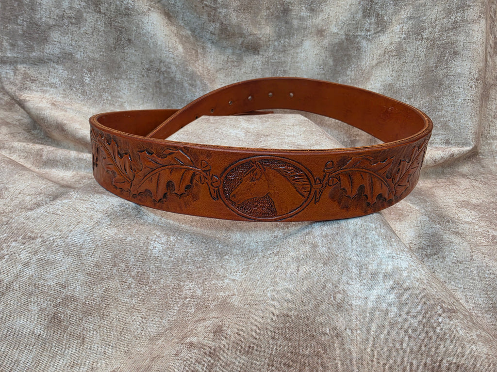 Hand tooled, hunter jumper themed custom belt, hand drawn timber horse image with oak leaf tooling, custom brand. Size 34"
