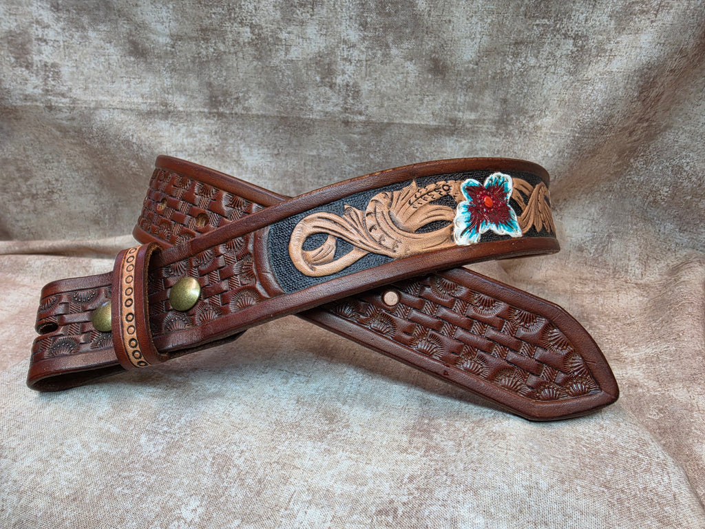 Hand tooled, golden brown, western belt with painter flowers. Size 28".