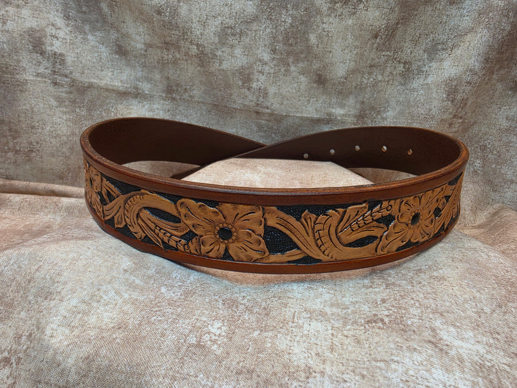Hand tooled, golden brown, western belt with Circle R Arena logo. Size 30".