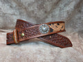 Hand tooled, golden brown, western belt with silver and gold horseshoe conchos.. Size 30".