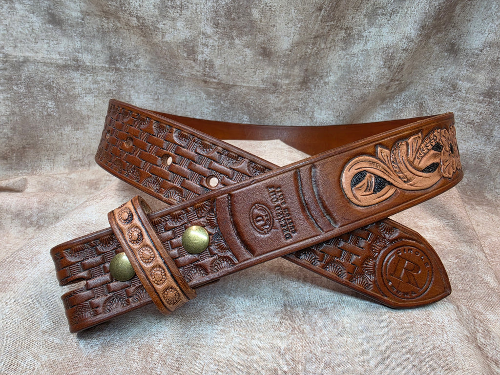 Hand tooled with Herman Oak leather, golden brown, western belt. Size 32".