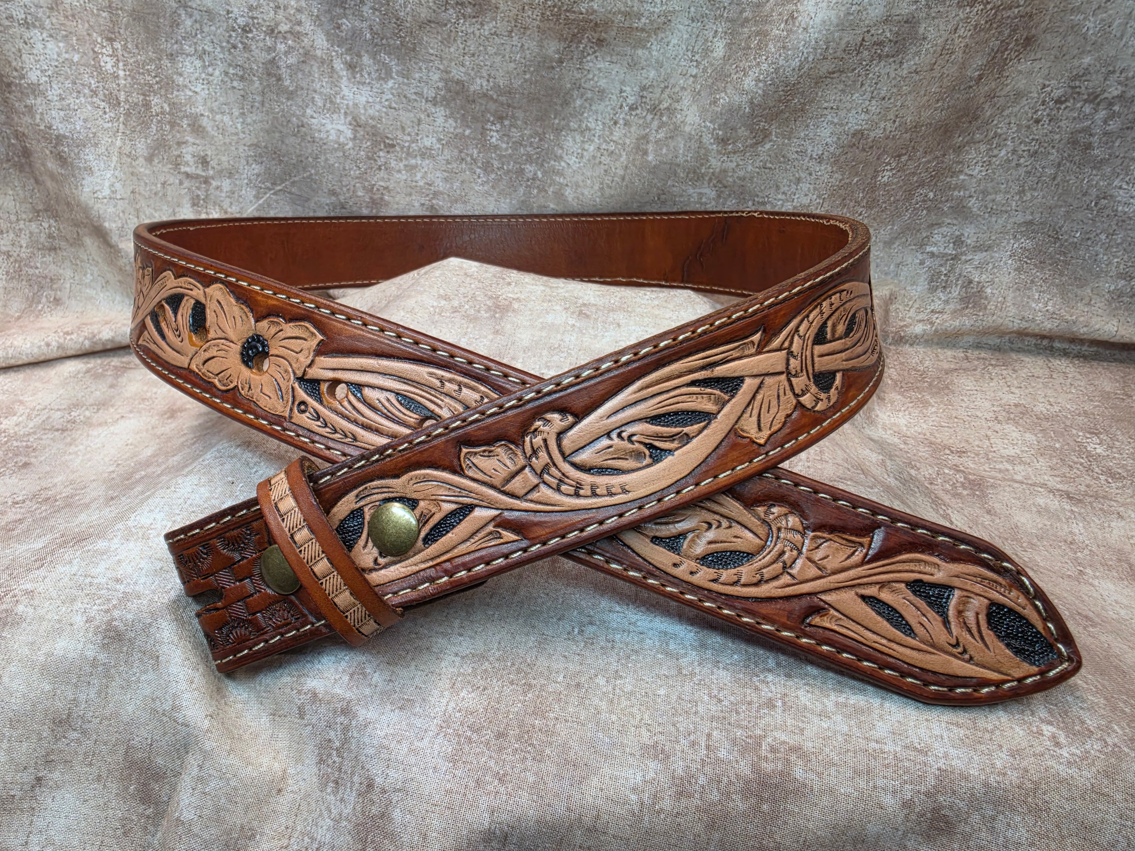 Hand tooled, golden brown, western belt. Size 36".