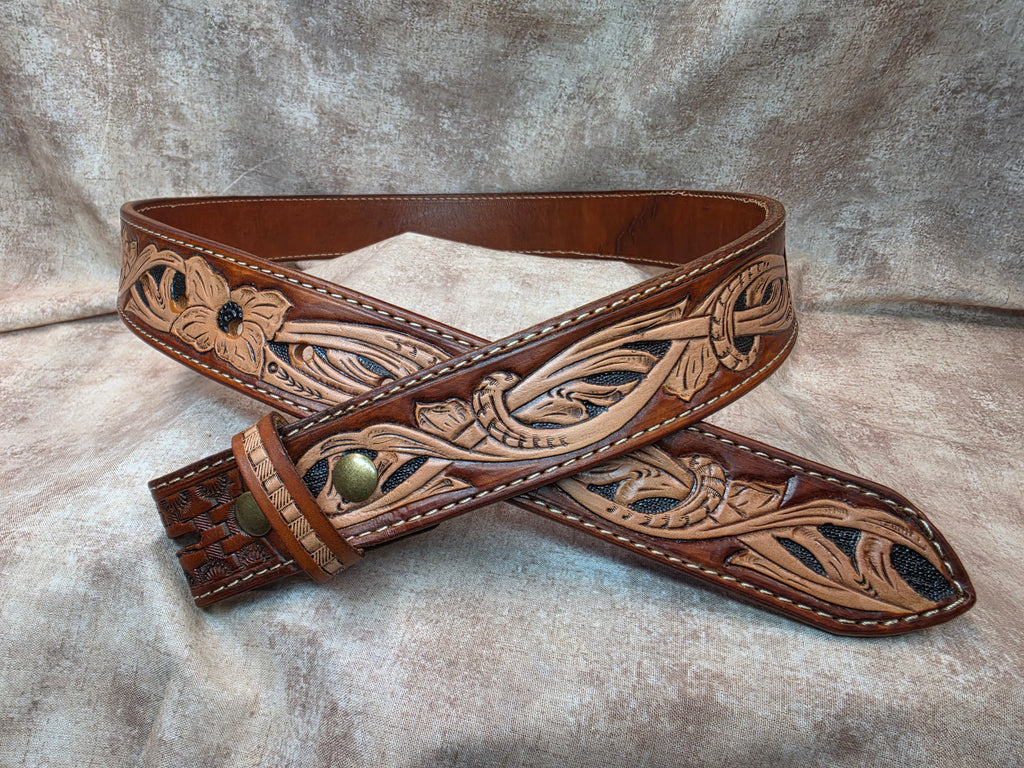 Hand tooled, golden brown, western belt. Size 36".