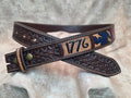 Hand tooled, western belt with 'We the People' theme, including flag, lined back, sewn edges, tooled keeper. Size 37".