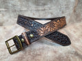 Complete hand tooled, western belt with antique brass buckle, lined back, sewn edges, tooled keeper. Size 31".