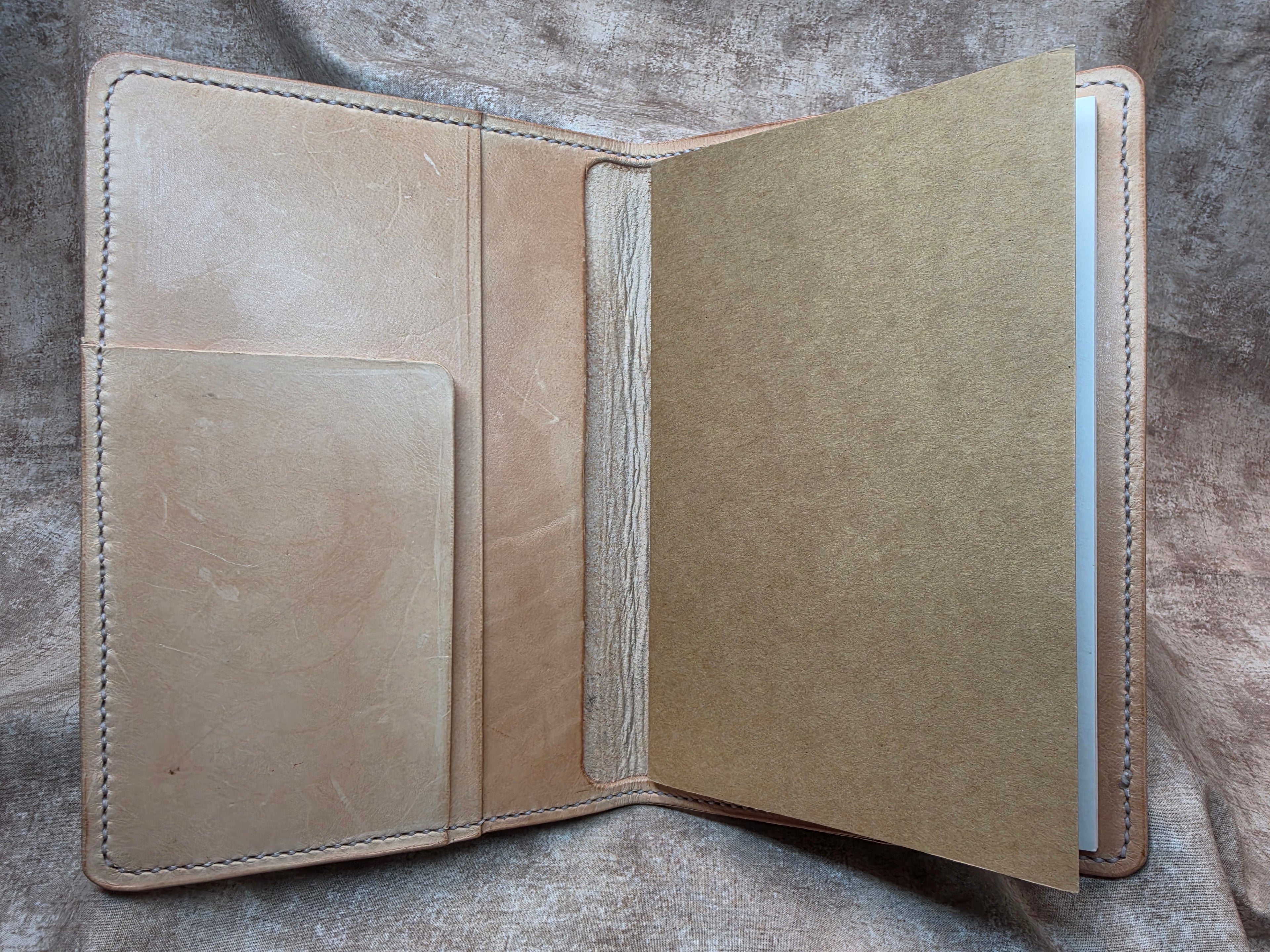 Folio, hand tooled and sewn, 9x6", two pocket, natural color
