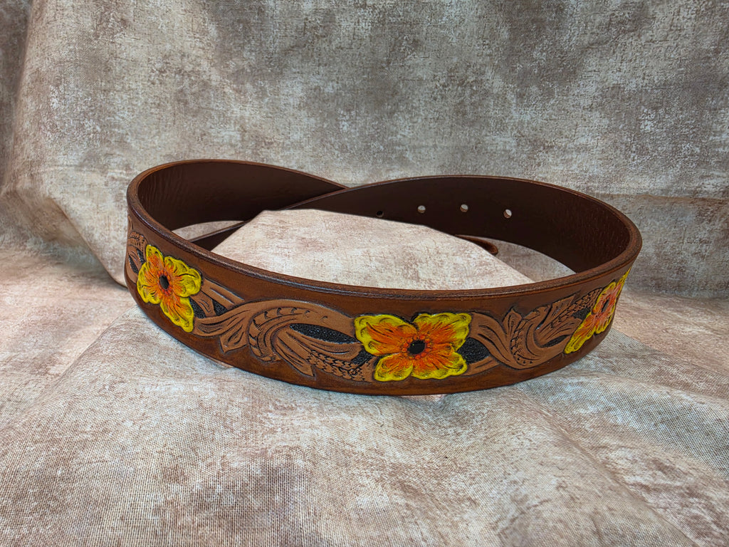 Hand tooled, western belt with painted flowers. Size 28".